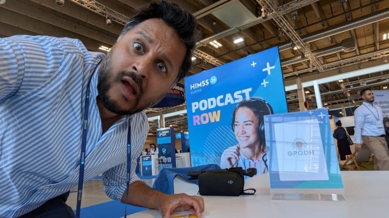 Dr Shubs Upadhyay at a podcast booth